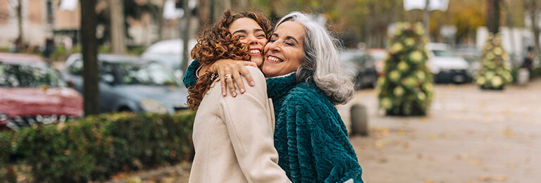 Two people hugging - hero image